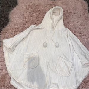 Fluffy poncho with hood